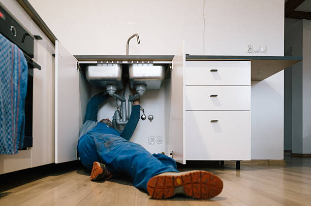 Professional Drain Cleaning technician working in Grasonville, MD